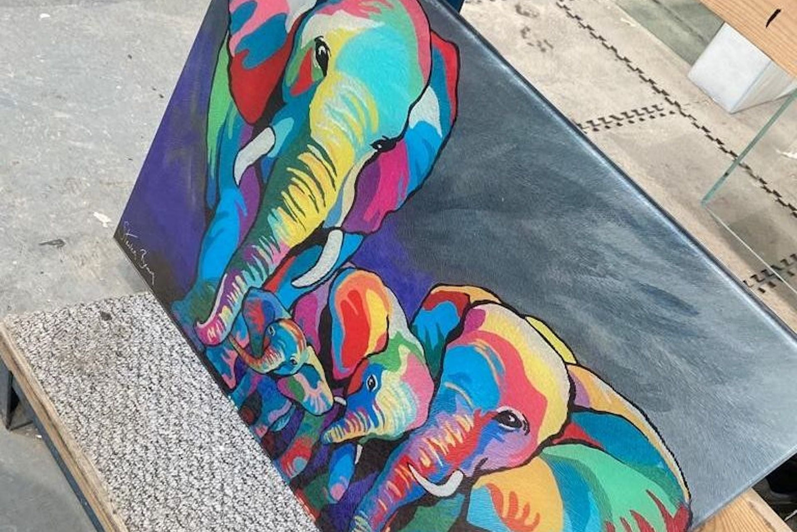 Muti coloured elephants from choosing the right glass wall art