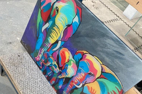 Muti coloured elephants from choosing the right glass wall art