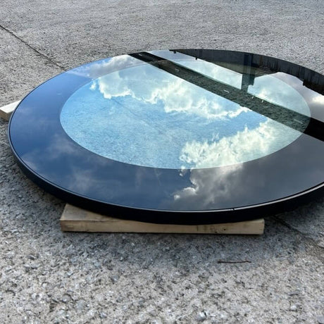 a glass well cover on the ground